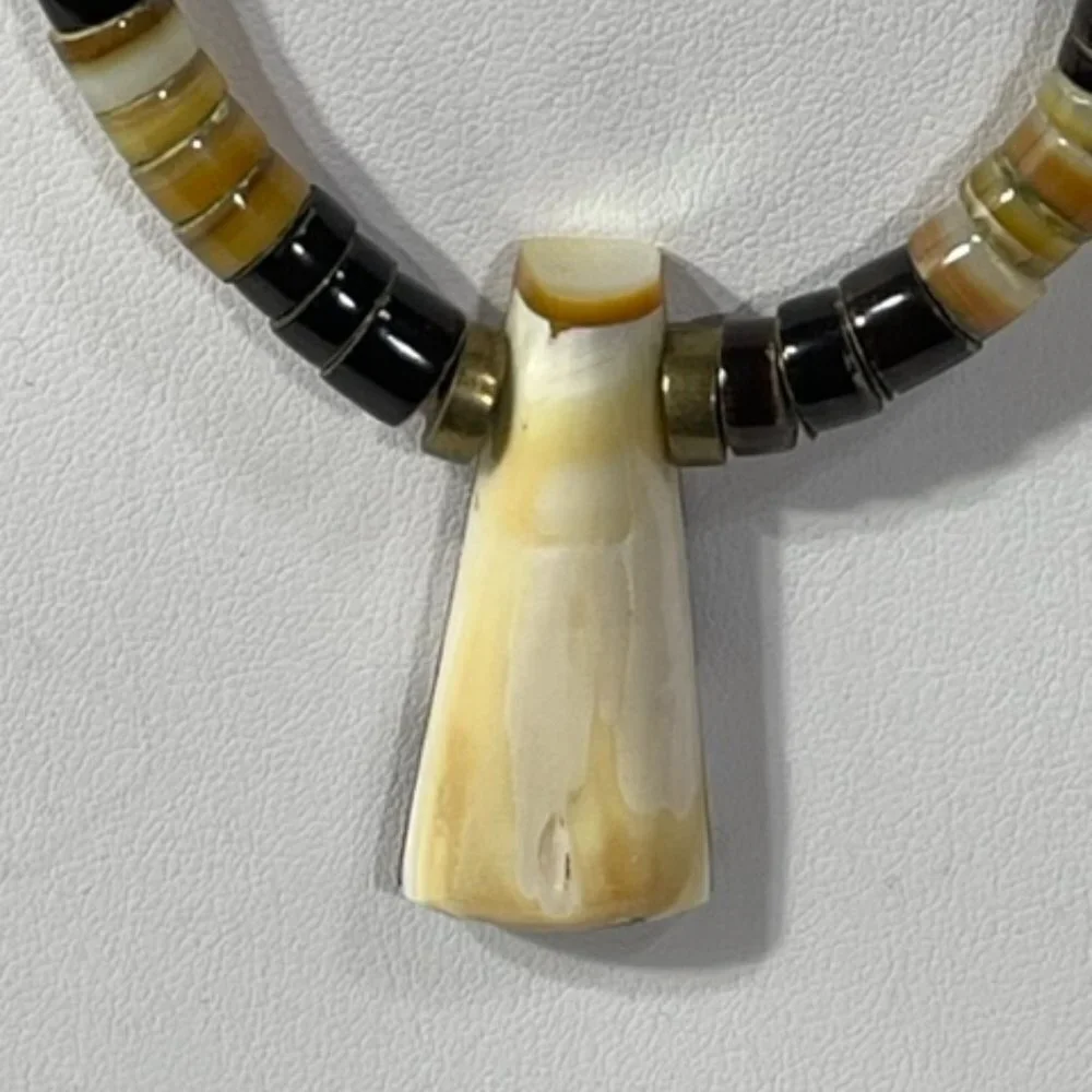 Vintage stone and inlay heishi necklace. Shell, onyx and jasper.